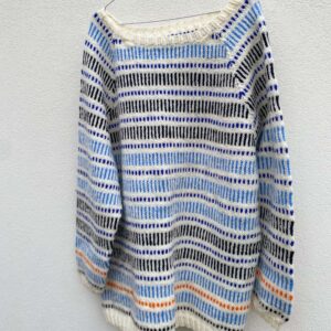 Islender i hvitt, blått, svart og oransje